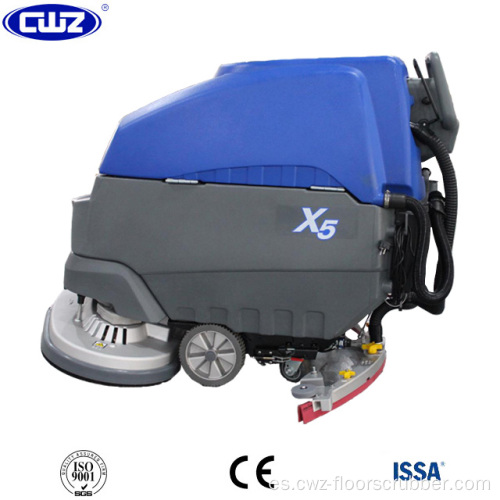 Fregadora-fregadora automática de doble cepillo con operador a pie detrás del piso